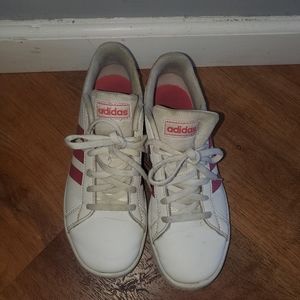 Adidas tennis sneakers.